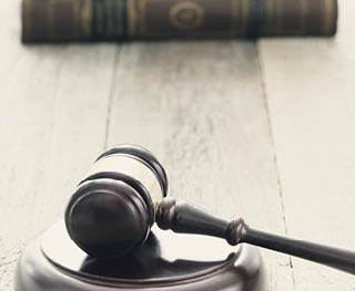 Justice. Judge hammer on the table